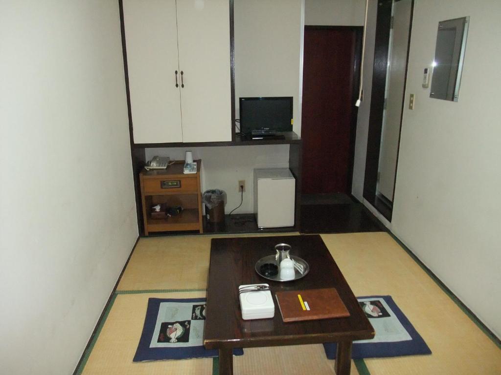 Hotel New Takahashi Takezono Цукуба Номер фото