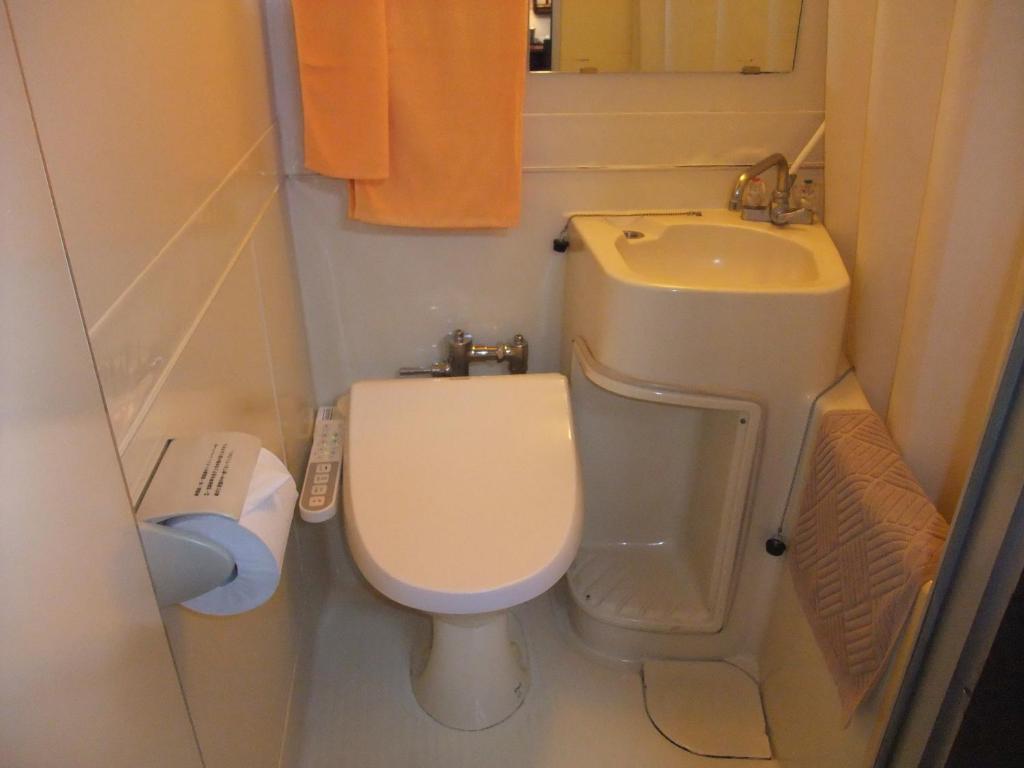 Hotel New Takahashi Takezono Цукуба Номер фото