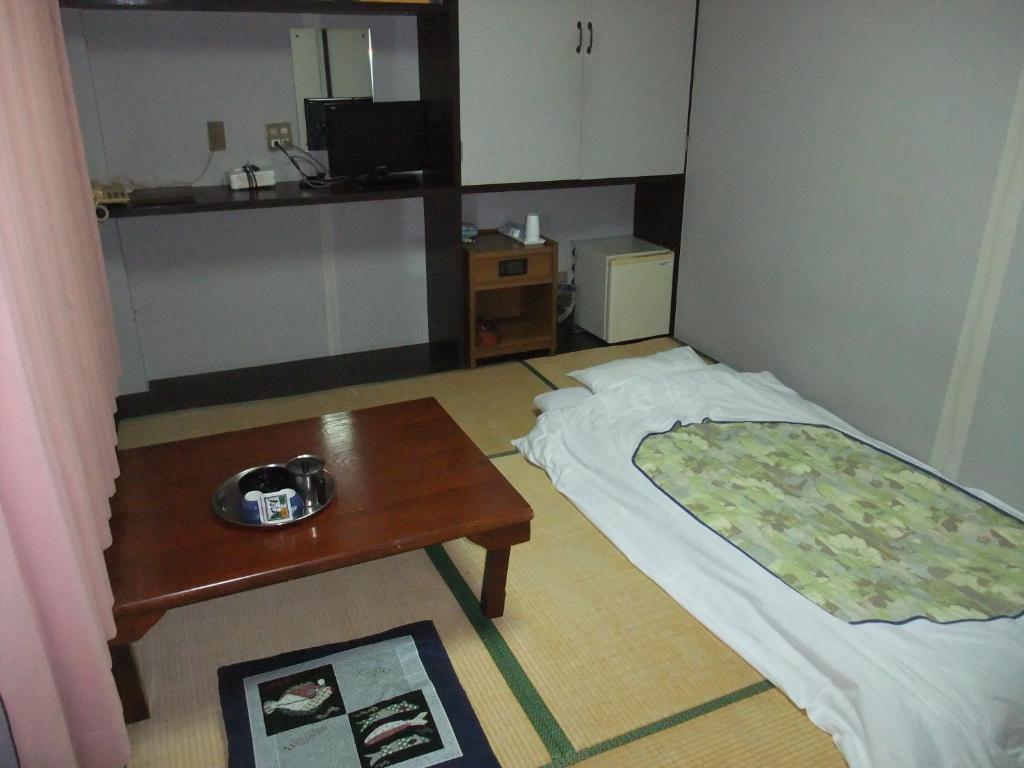 Hotel New Takahashi Takezono Цукуба Номер фото