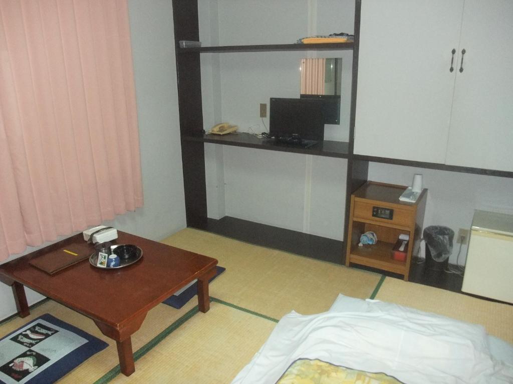 Hotel New Takahashi Takezono Цукуба Номер фото