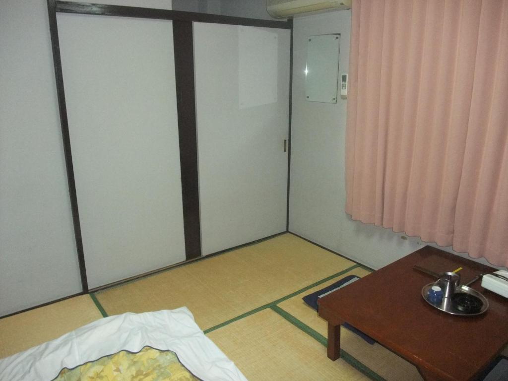Hotel New Takahashi Takezono Цукуба Номер фото