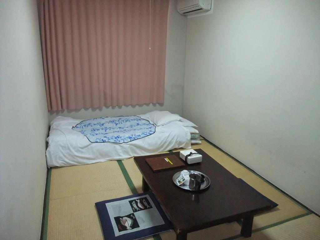 Hotel New Takahashi Takezono Цукуба Номер фото