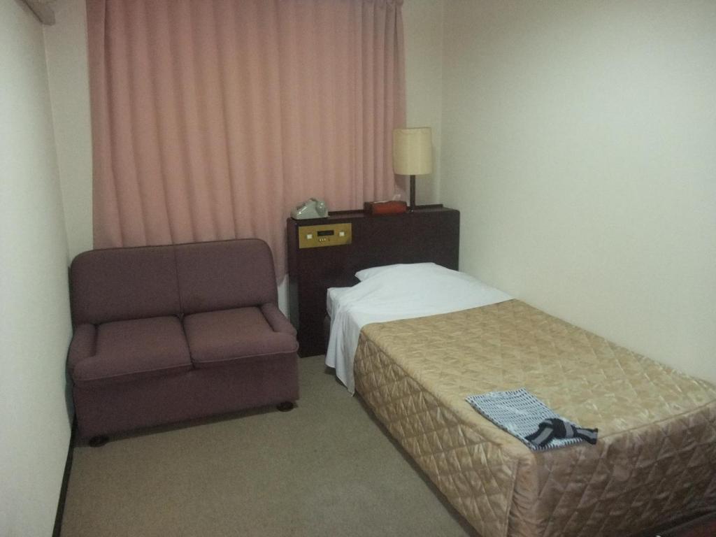 Hotel New Takahashi Takezono Цукуба Номер фото