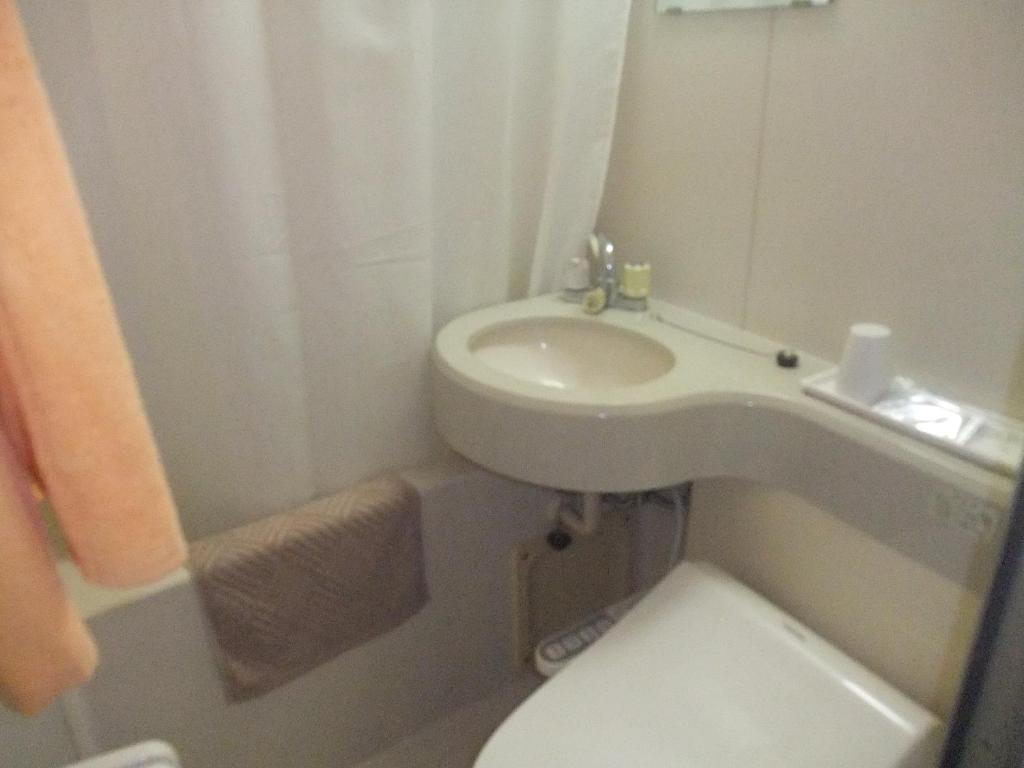 Hotel New Takahashi Takezono Цукуба Номер фото