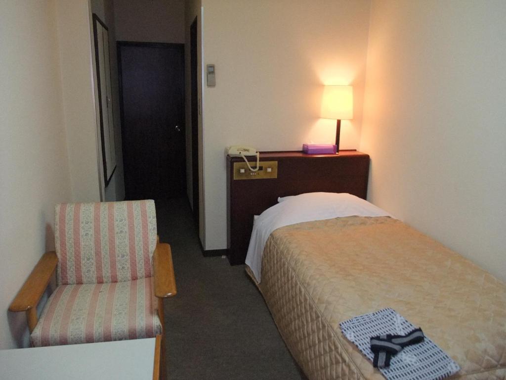 Hotel New Takahashi Takezono Цукуба Номер фото